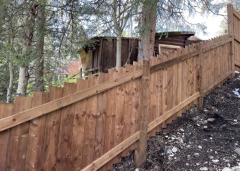 Angled wood fence on a hill